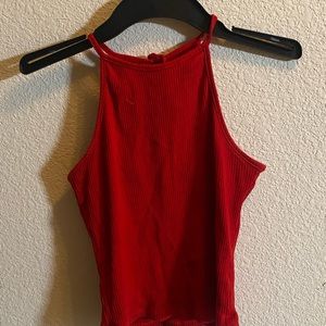 Red cropped halter top, with a tie back, from activie USA, size small